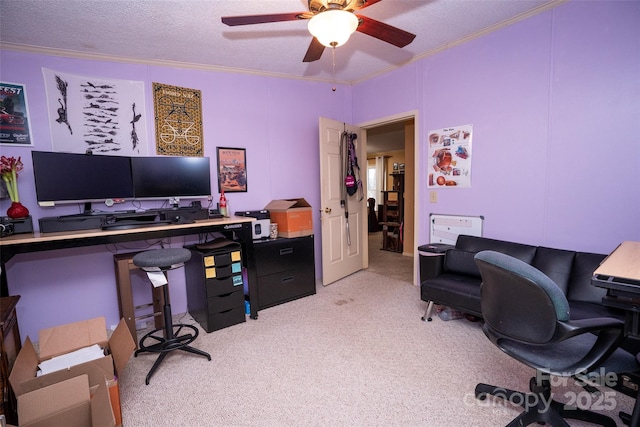 office area featuring ceiling fan, ornamental molding, a textured ceiling, and light colored carpet