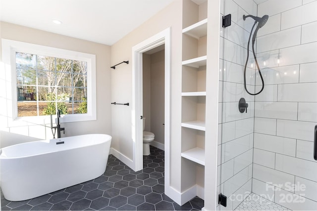 full bath featuring toilet, a stall shower, built in shelves, and a soaking tub