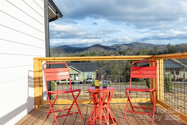 balcony featuring a mountain view