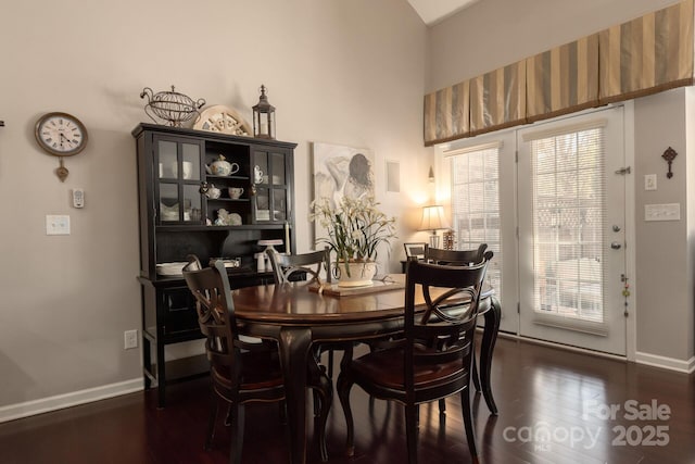 dining room featuring dark hardwood / wood-style flooring