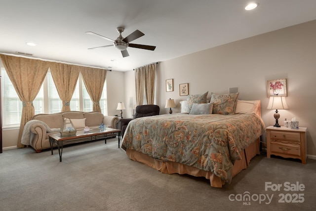 bedroom with ceiling fan and carpet flooring