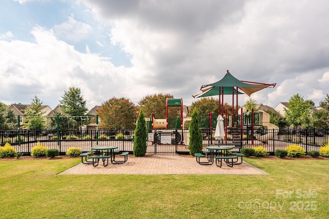 view of jungle gym featuring a lawn