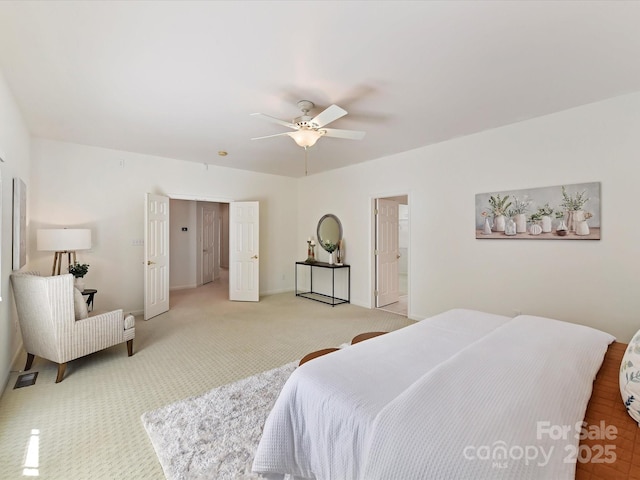 carpeted bedroom featuring ceiling fan