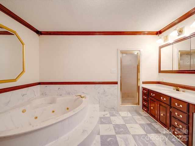 bathroom featuring ornamental molding, shower with separate bathtub, a textured ceiling, and vanity