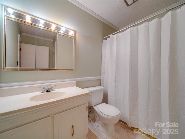 bathroom featuring ornamental molding, vanity, a textured ceiling, and toilet