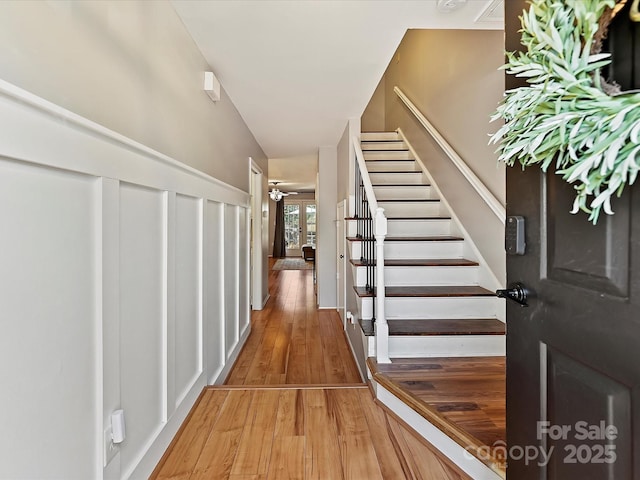 entryway with hardwood / wood-style floors