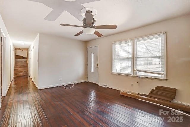 entrance foyer with dark hardwood / wood-style floors and ceiling fan