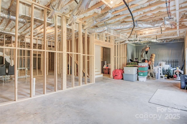 miscellaneous room with concrete flooring