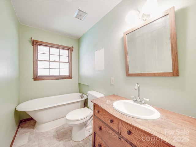 full bath featuring toilet, visible vents, a soaking tub, and vanity