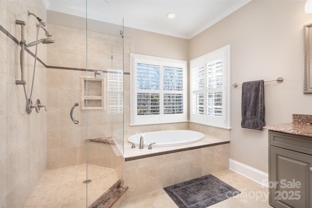 bathroom featuring plus walk in shower, tile patterned flooring, ornamental molding, and vanity