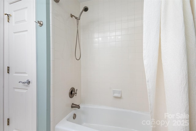 bathroom with shower / tub combo