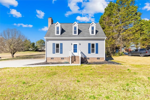 cape cod-style house featuring crawl space, a shingled roof, a chimney, and a front yard