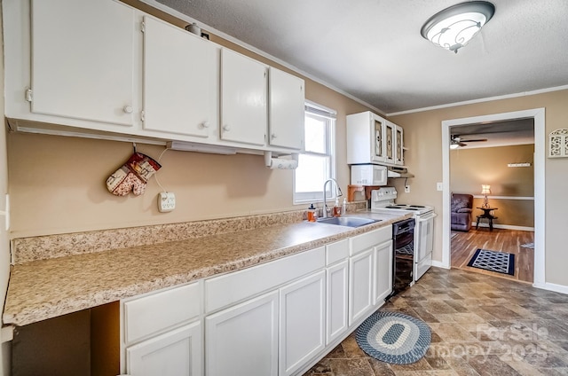 kitchen featuring crown molding, white electric stove, light countertops, white cabinetry, and a sink