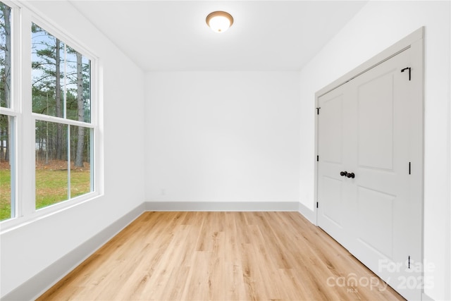5147 Star Magnolia Ct, Clover, SC 29710 - spare room with baseboards and light wood-style floors