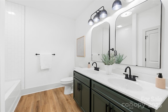 5147 Star Magnolia Ct, Clover, SC 29710 - full bath featuring toilet, wood finished floors, double vanity, and a sink