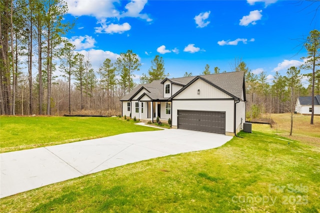 5147 Star Magnolia Ct, Clover, SC 29710 - modern inspired farmhouse featuring a garage, cooling unit, concrete driveway, and a front yard