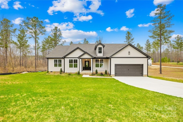 5147 Star Magnolia Ct, Clover, SC 29710 - modern inspired farmhouse with a shingled roof, a front yard, a garage, and concrete driveway