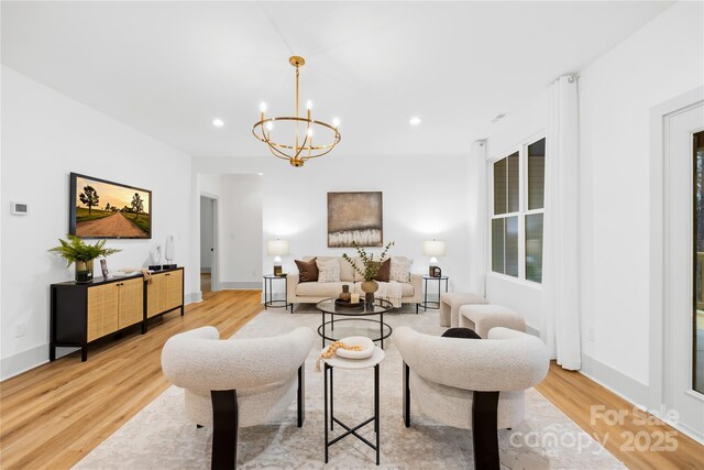 5147 Star Magnolia Ct, Clover, SC 29710 - living area with recessed lighting, a notable chandelier, baseboards, and light wood-type flooring