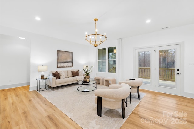5147 Star Magnolia Ct, Clover, SC 29710 - living area featuring recessed lighting, baseboards, a chandelier, light wood-style floors, and visible vents