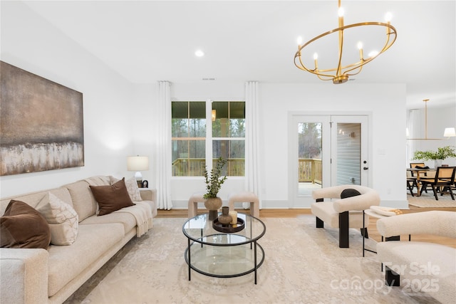 5147 Star Magnolia Ct, Clover, SC 29710 - living room featuring wood finished floors, baseboards, a chandelier, and recessed lighting
