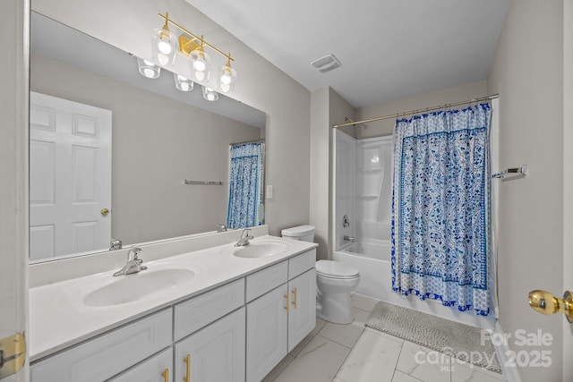 full bathroom featuring shower / bathtub combination with curtain, vanity, and toilet