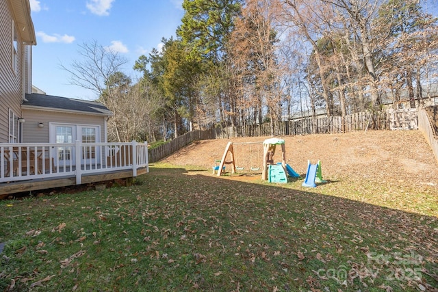 view of yard featuring a wooden deck