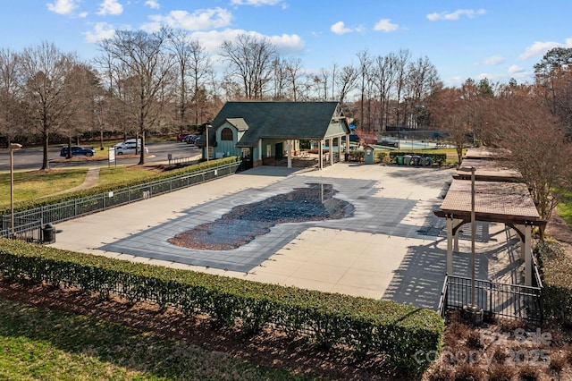 view of property's community with a patio area and a swimming pool