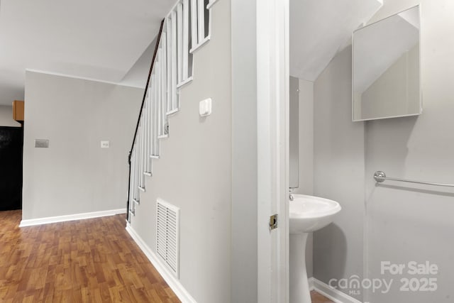 bathroom featuring hardwood / wood-style floors