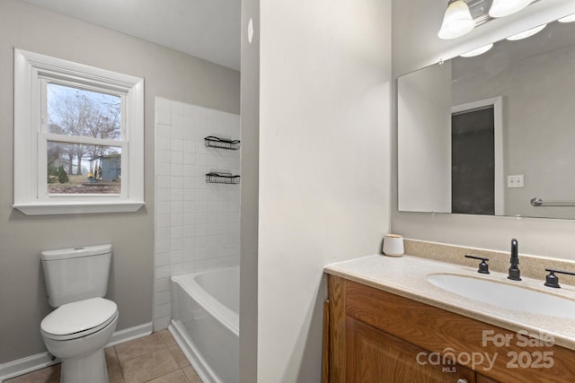 full bathroom with tiled shower / bath combo, tile patterned flooring, vanity, and toilet