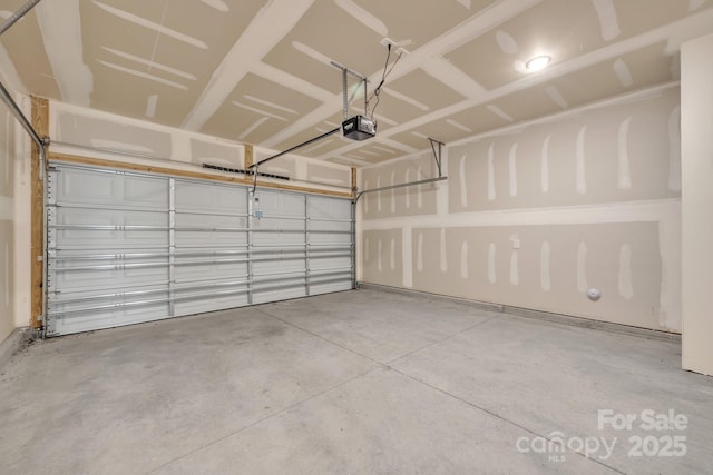 garage featuring a garage door opener