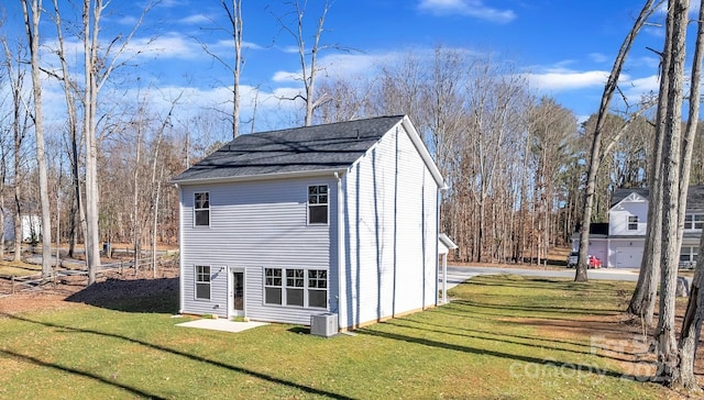 view of outbuilding featuring central AC unit