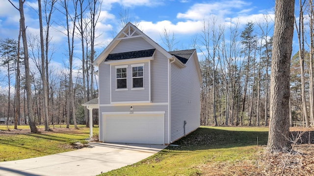 view of side of home featuring a garage, concrete driveway, and a yard