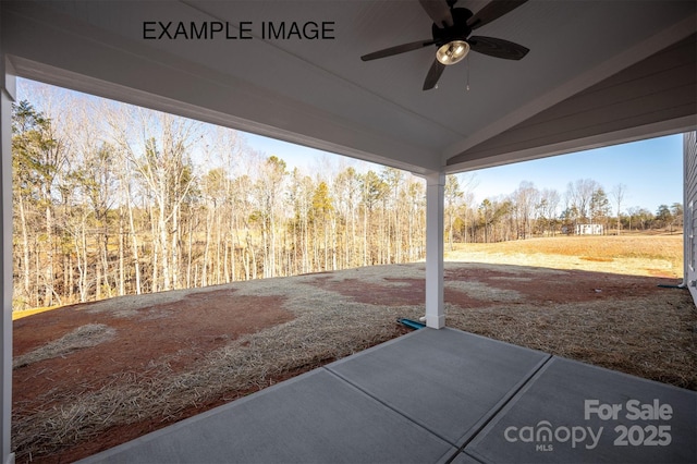 11016 Tyler Brook Ln Unit Oak0036, Mint Hill, NC 28227 - view of patio with a ceiling fan and a wooded view