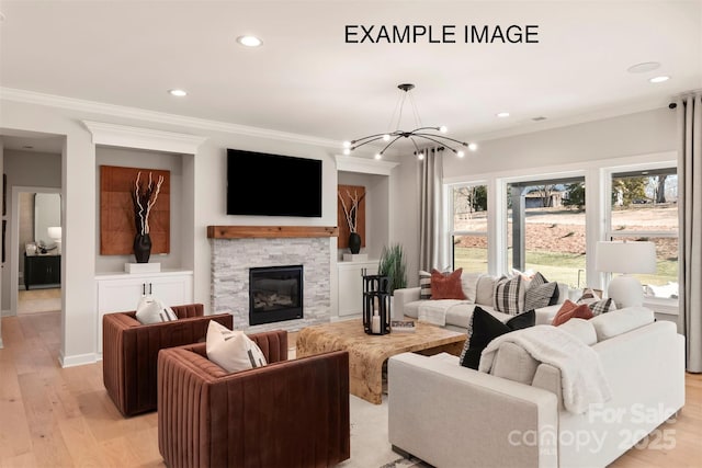 11016 Tyler Brook Ln Unit Oak0036, Mint Hill, NC 28227 - living area featuring crown molding, light wood-type flooring, a chandelier, recessed lighting, and a fireplace