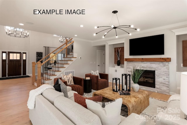 11016 Tyler Brook Ln Unit Oak0036, Mint Hill, NC 28227 - living area with a chandelier, wood finished floors, stairs, ornamental molding, and recessed lighting