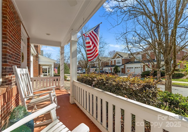 balcony featuring covered porch