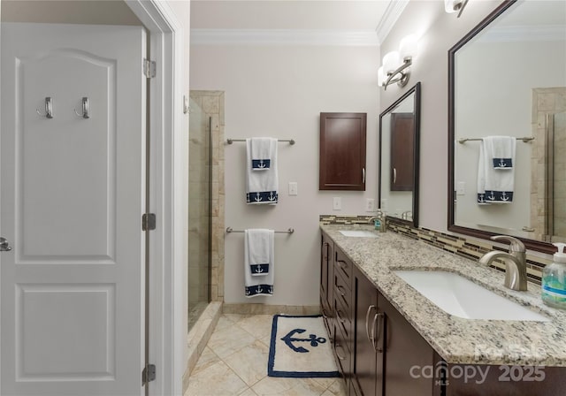 bathroom featuring crown molding, vanity, and a shower with shower door