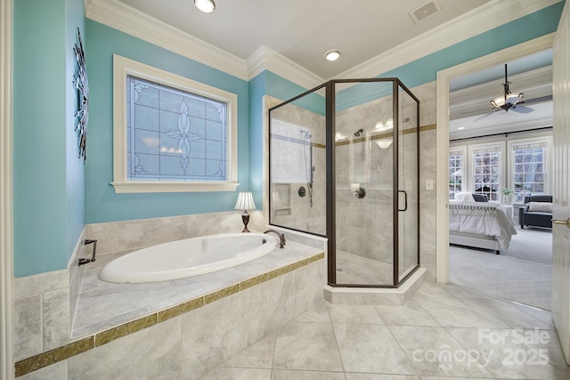 bathroom with a shower stall, ornamental molding, a garden tub, and visible vents