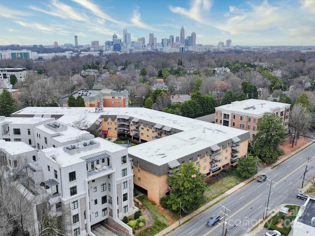birds eye view of property with a view of city