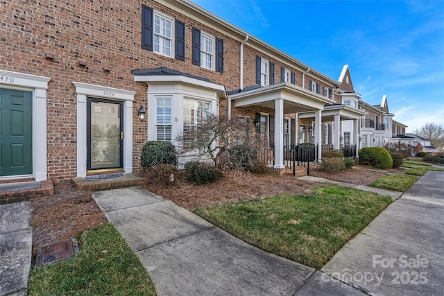 view of front of property with brick siding