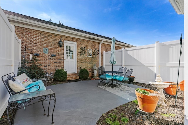 view of patio / terrace with fence