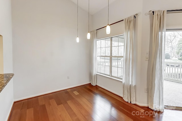 5011 Sharon Rd Unit B, Charlotte, NC 28210 - unfurnished dining area featuring wood finished floors and baseboards