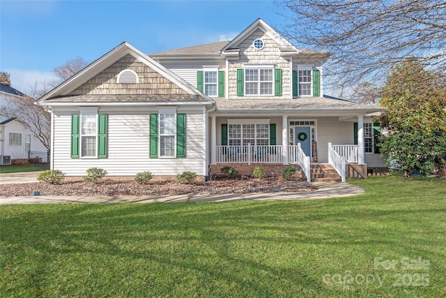 view of front of house with a porch, central AC unit, and a front yard