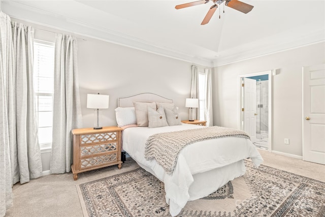 bedroom featuring ensuite bathroom, lofted ceiling, carpet flooring, ceiling fan, and crown molding