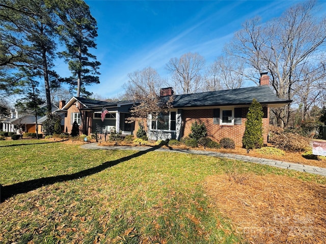 ranch-style home with a front yard