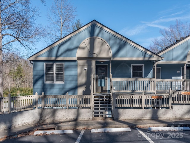 bungalow-style house featuring covered porch