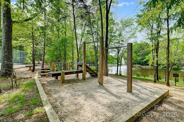 view of play area featuring a water view