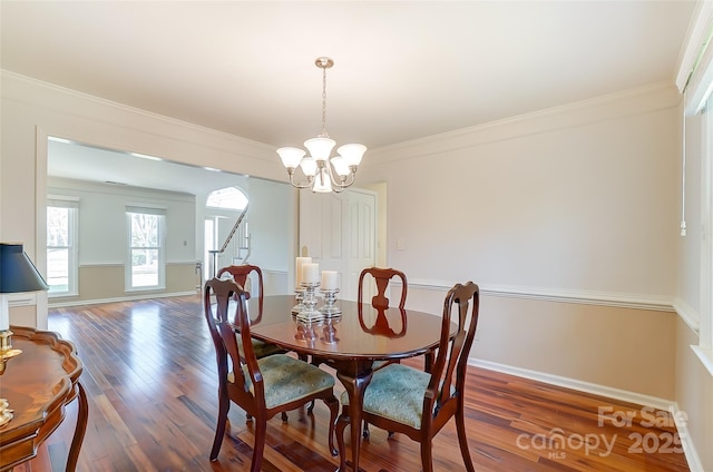 dining area featuring a chandelier, dark wood-style flooring, baseboards, ornamental molding, and stairway