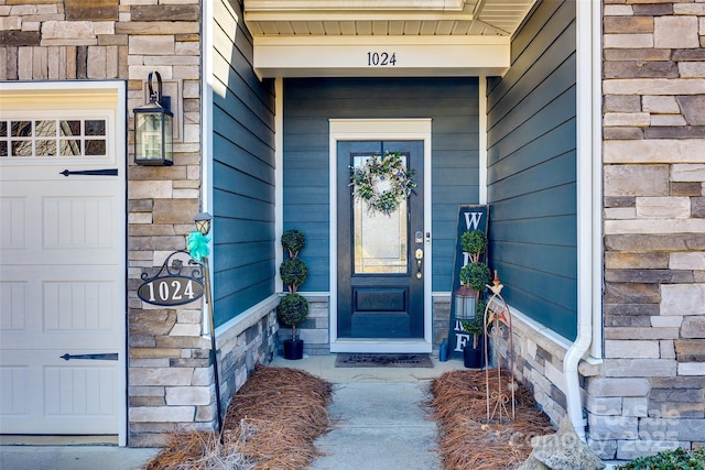view of exterior entry with stone siding