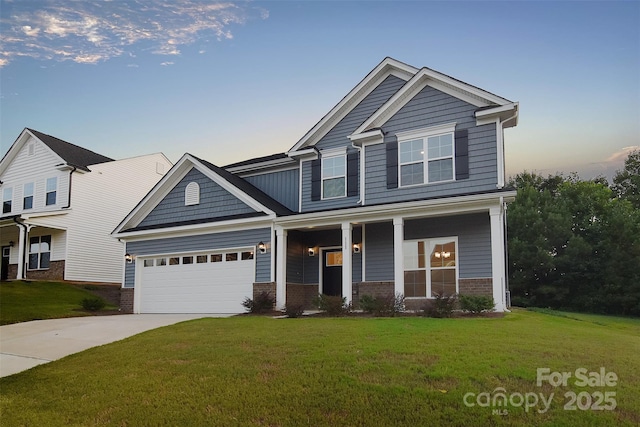 craftsman-style house featuring brick siding, driveway, and a front lawn